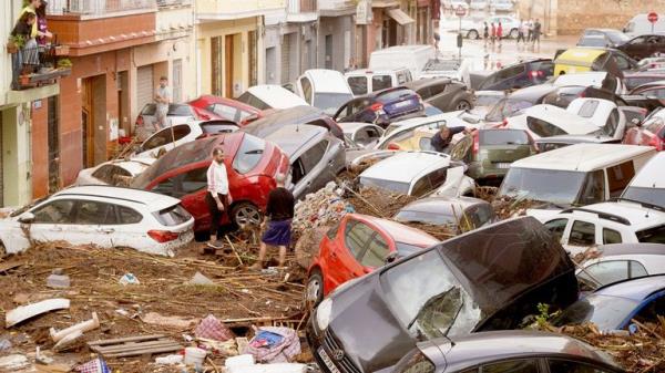 Members of a rescue team search for missing people near a river after heavy rains caused flooding in Letur, Spain
Pic: Reuters